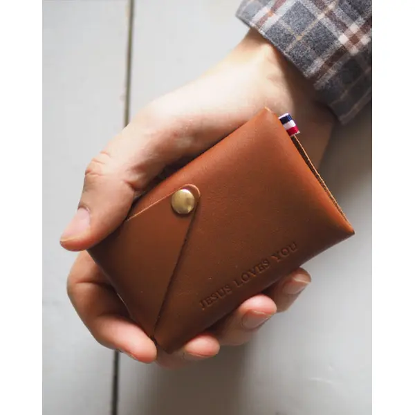 Portefeuille en cuir Jesus loves you