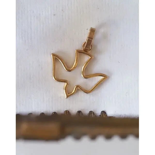 Pendentif Colombe ajourée en laiton