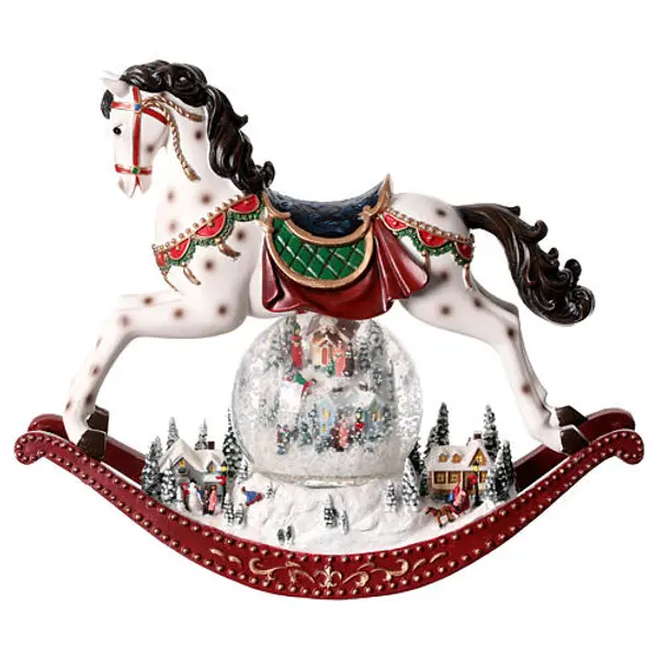 Boule à neige cheval à bascule et village 30x12x30 cm