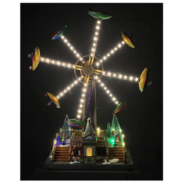 Manège avions de Noël animé lumières et musique 40x20x50 cm